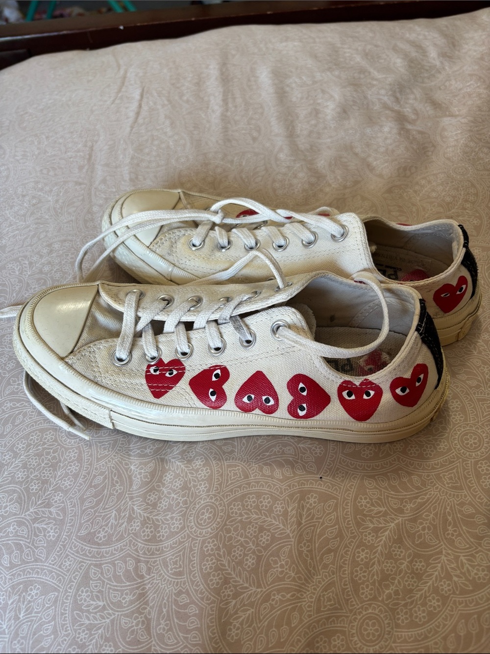 Converse White Low-Top Sneakers with Red Heart Motifs